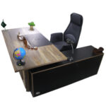 Durable L-shaped office table with side rack.