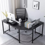 Modern office table with powder-coated frame and L-shaped design for better workspace utilization.