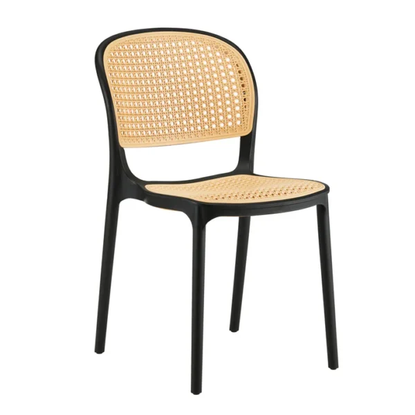 Stylish vintage rattan café chair for indoor and outdoor seating.